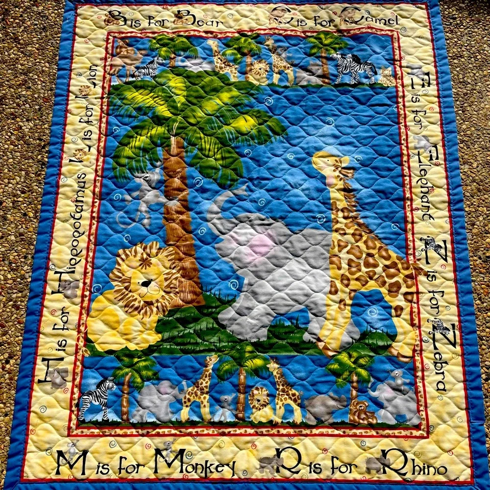 Quilt with animal print, Size 34” x 43”